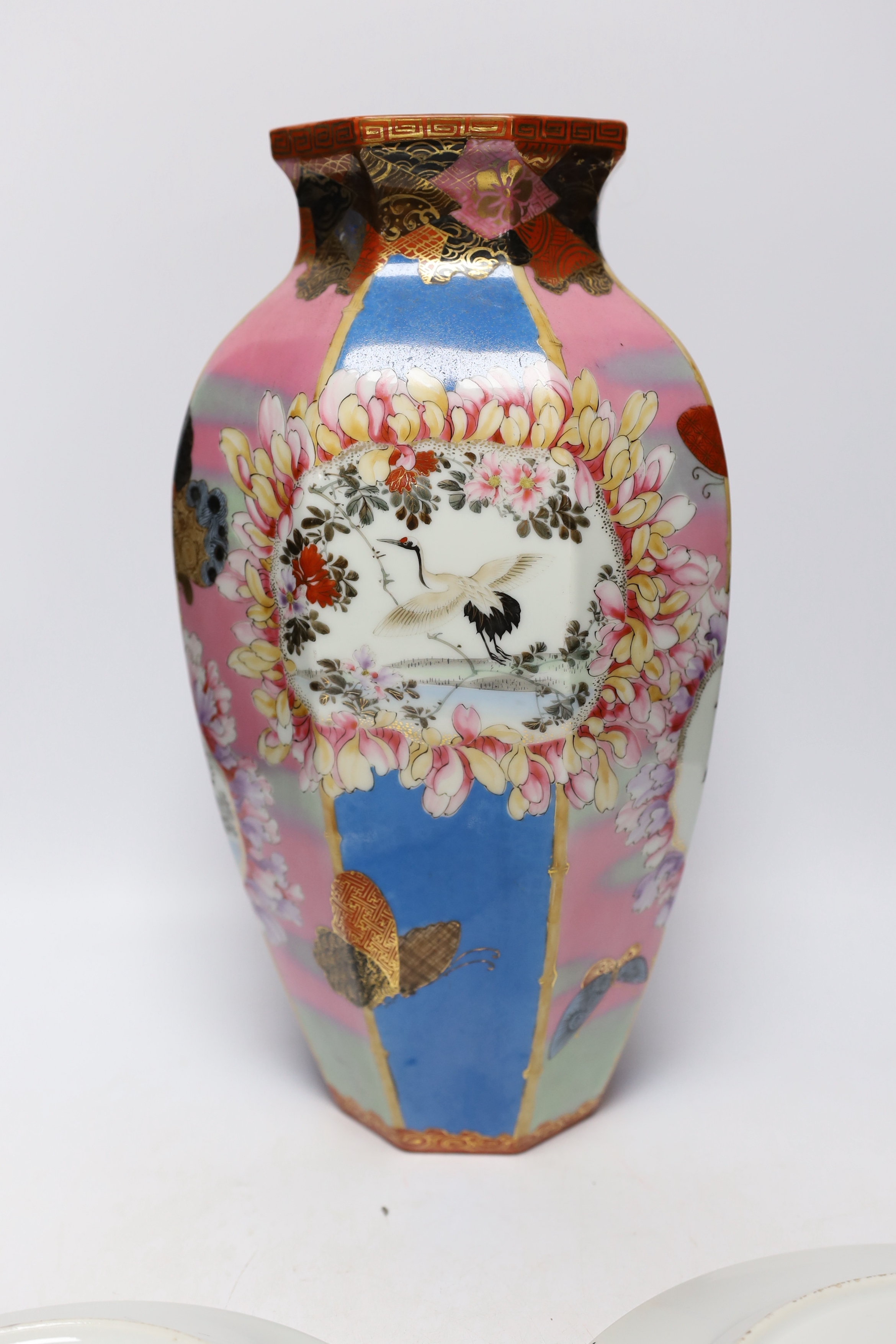 A group of Japanese and Chinese porcelain including an 18th century Chinese export dish, tallest 36cm